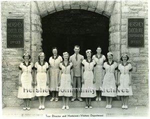 Hershey Chocolate Factory visitors department; Tour Director Lloyd Shoap and hostesses. ca.1936-1940