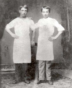 Milton Hershey (right) poses with another worker at Royer's Ice Cream Parlor and Garden in Lancaster, PA. ca. 1873