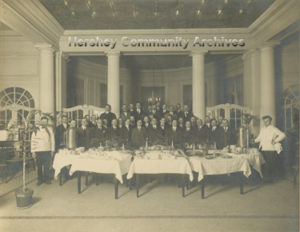 Y.M.C.A.’s Busy Men’s Doggy Bow-Wow meets for a celebratory meal in the Hershey Café. 3/1913