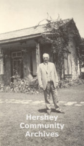 Milton Hershey standing outside his home in Central Rosario, Cuba, ca. 1920