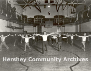 Hershey Men's Club offered a wide range of fitness programs such as the Busy Men's Gym Class, led by Mr. "Doc" Brandau, ca. 1912-1913