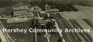 Hershey Industrial School (now Milton Hershey School) boys spell out “HERSHEY” in front of the school greenhouse, 1923