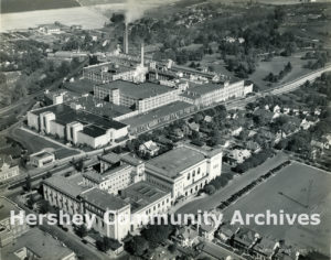 The vast Community Building (visible in the lower half of the photo) never operated profitably. Downtown Hershey, ca. 1935-1939