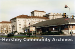 As a temporary solution, a one story shopping center was built on the corner of Chocolate and Cocoa Avenues in 1985. Photograph of shopping center and Community Building, 1991