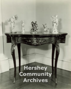 Some of the items from Milton S. Hershey’s estate that were sold at auction on December 17 and 18, 1945. Photograph of table and figures, ca. 1970-1980