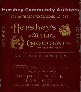 Hershey’s Milk Chocolate bar wrapper in gold and maroon. Hershey marketed bars in a variety of sizes, including a 8 ounce bar, retailing for 40 cents. 1902