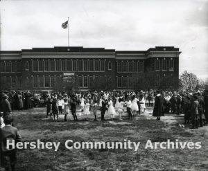 Children celebrate the arrival of May with a May Dance, ca. 1915-1920