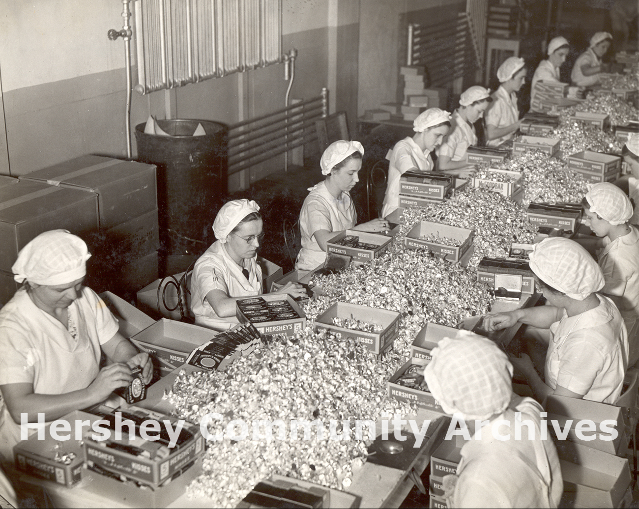 Hershey Chocolate Factory, packing Kisses chocolates by hand, March 1937