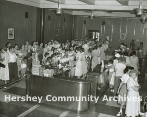Hershey Chocolate factory tour. At the end of the tour, visitors received free samples of chocolate and cocoa milk. ca. 1950-1960
