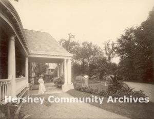 Catherine Hershey standing in the driveway for 222 South Queen Street, Lancaster, PA, ca. 1900