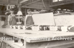 Carpenters crafting wooden features during construction of The Hotel Hershey, ca. 1932-1933